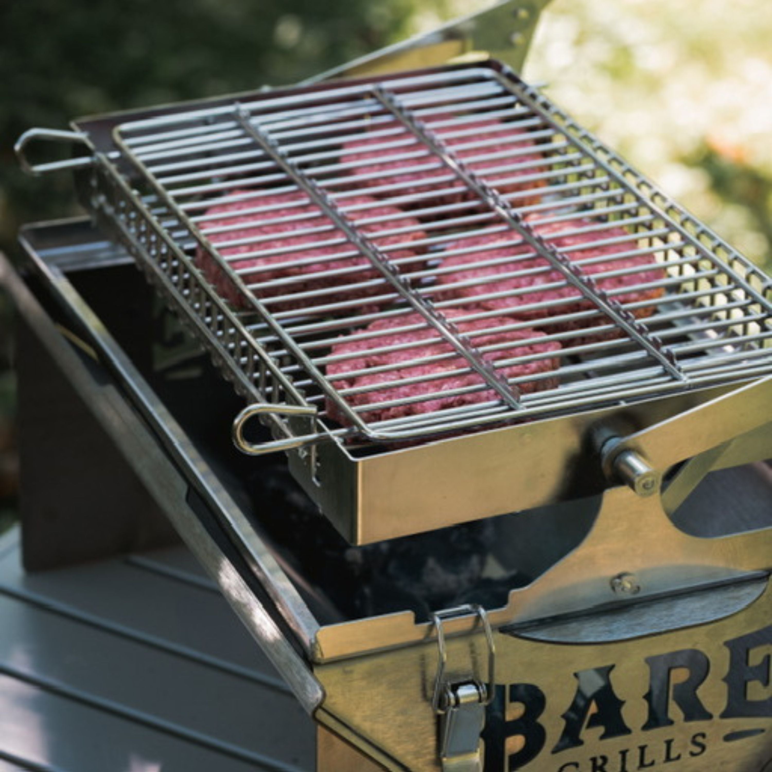 Barbecue portatif au charbon "Baregrills"